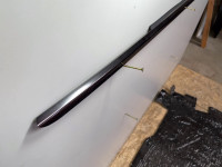 Door edge trim bar with beltline