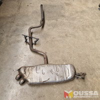 Exhaust silencer with pipe