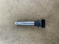 Ignition coil with spark plug connector