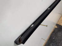 Door edge trim bar with rail