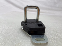 Seat backrest lock striker