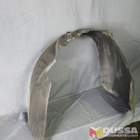 Wheel arch mud guard