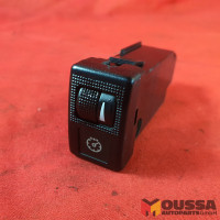 Headlight range regulator switch