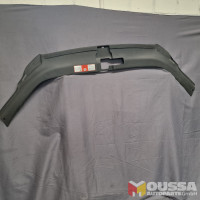Radiator lid trim slam panel