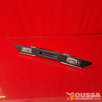 Boot handle license plate lamp
