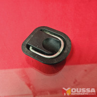 Trunk eyelatch storage bracket