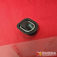 Trunk eyelatch storage bracket