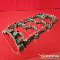 Cylinder head camshaft plate