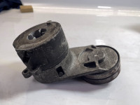 Belt tensioner damper