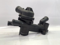 Coolant regulator housing