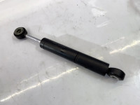 Belt tensioner shock absorber