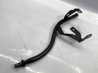 Engine oil gauge tube guide