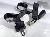 Seat belt with tensioner
