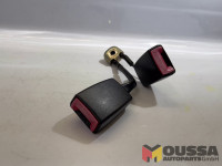 Seat belt tensioner buckle