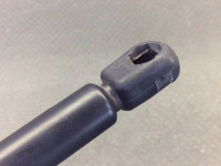 Gas pressure tailgate damper bonnet spring