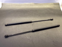 Pressure spring struts