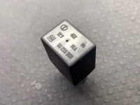 Headlamp electric relay