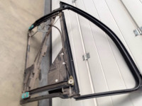 Door frame window mechanism