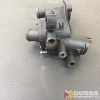 Thermostat housing coolant regulator cooling